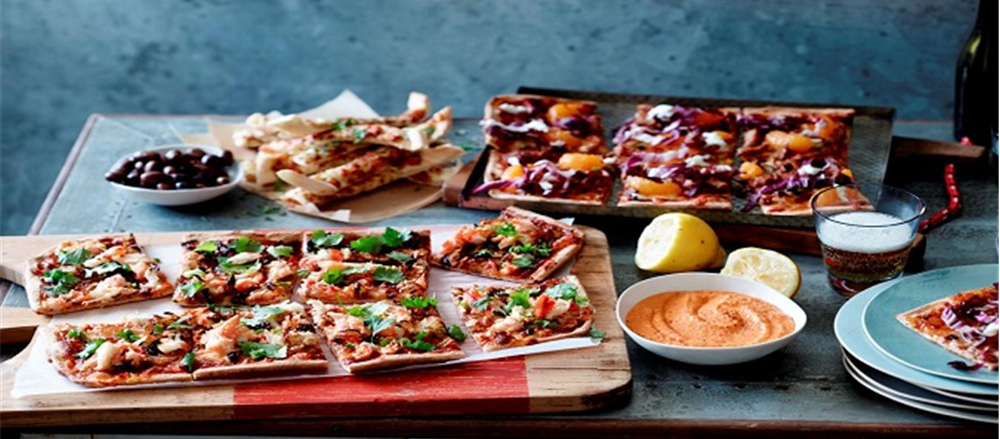 Which food stock to buy? - Domino's or Retail Food Group